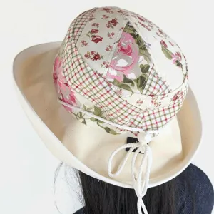 Sunblocker UV summer sun hat with wide brim, quilted one of a kind featuring reds and greens, adjustable fit