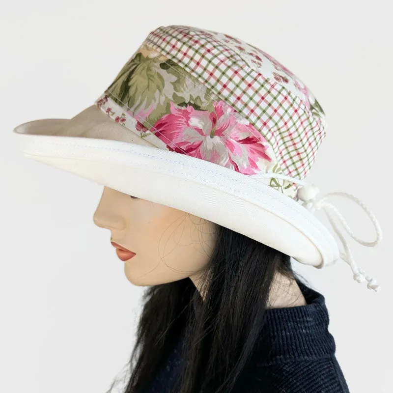 Sunblocker UV summer sun hat with wide brim, quilted one of a kind featuring reds and greens, adjustable fit